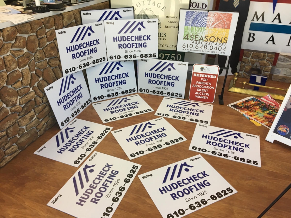 Hudecheck Roofing Signs angled