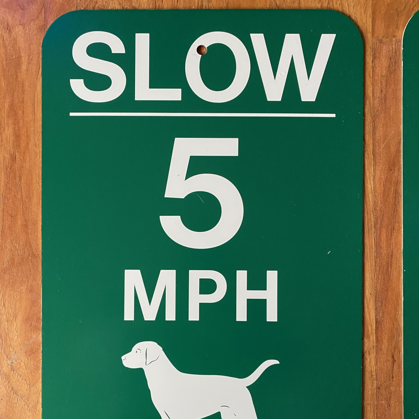 Slow 5 MPH Dog Aluminum Sign closeup