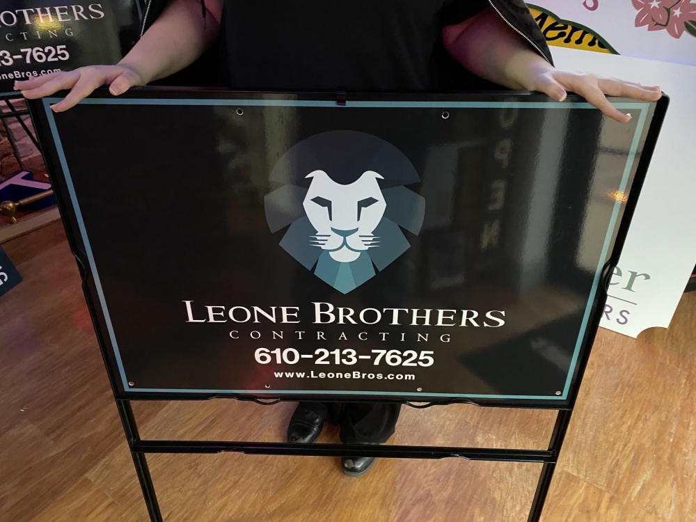 Leone Brothers Sign in Metal Frame
