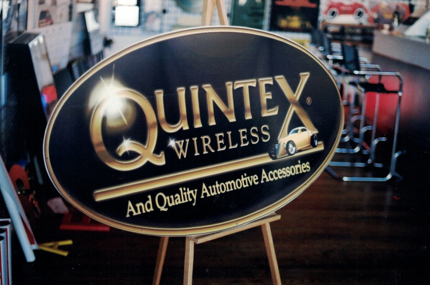 Quintex logo on redwood