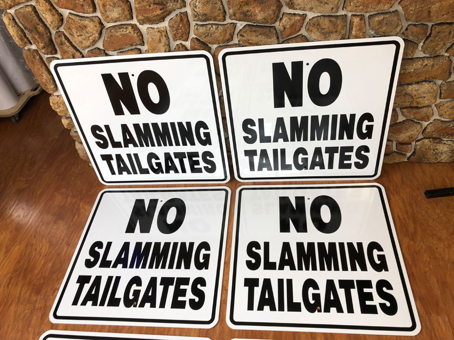 Tailgates Aluminum Signs closeup
