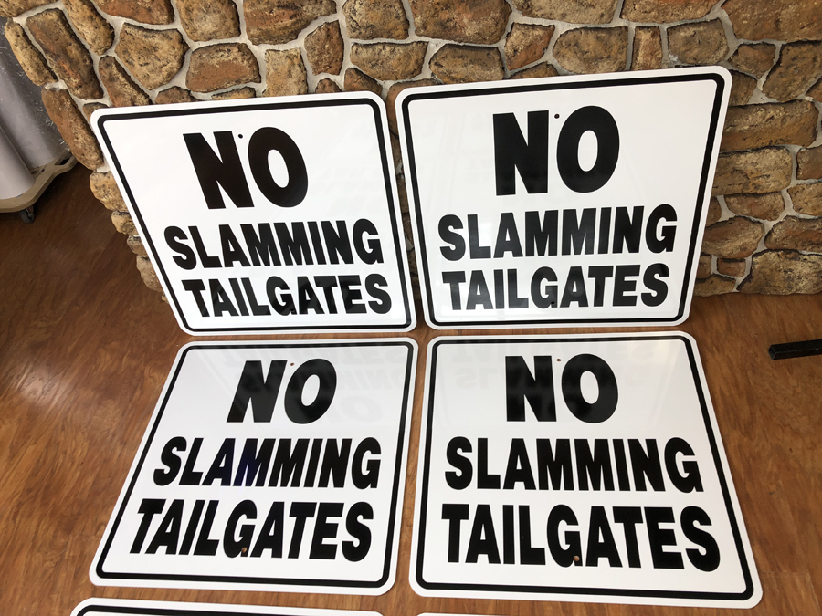 Tailgates Safety Signs closeup