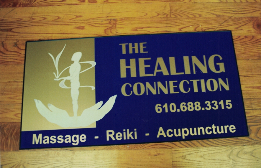 The Healing Connection logo on sign