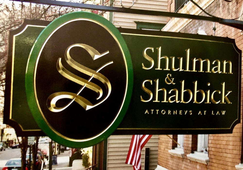 Shulman & Shabbick Hanging Sign